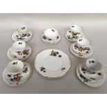 A fine bone china part tea service from Royal Ascot cream ground with floral spray heightened in 22