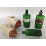 Three late 19th/early 20th Century green glass pharmacy jars with stoppers,