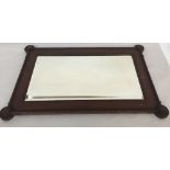 A rectangular mirror with gadrooned frame and bevel edge glass 89x59cm