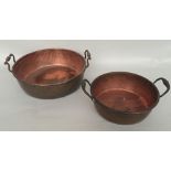 Two vintage copper preserve pans with twin handles, round,