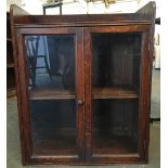 An Edwardian mahogany kitchen cabinet with two internal shelves with glazed doors 70cmH x 30 x 60