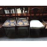 Three dining chairs with upholstered seats