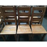 Six ladder-back kitchen chairs