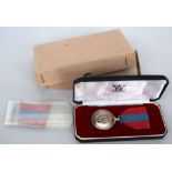 Boxed Queen Elizabeth II Imperial Service medal awarded to Miss Doris Irene Ibon,
