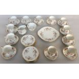 A Paragon china 'Victoriana Rose' pattern part tea set with tea cups, saucers and plates,