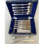 A boxed silver flatware canteen by Mappin and Webb comprising of 6 forks and 6 fish knives