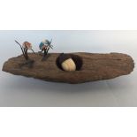 Two Albany Worcester figurines of a harvest mouse and a kingfisher together with a wooden pestle