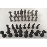 A 20th century medieval style Pewter chess set (32pc)