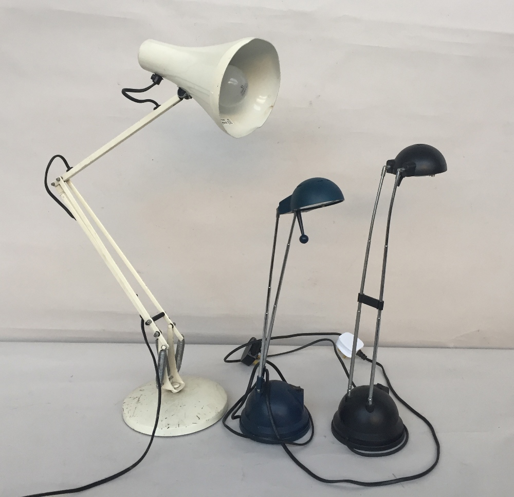 A cream Anglepoise lamp 75cm fully extended together with two telescopic desk lamps one blue,