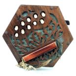 A Rosewood Concertina with carved pierced foliate ends, twenty keys,