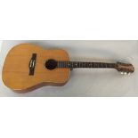 A six string acoustic guitar 107cmL,