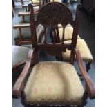A set of eight dining chairs to include two carvers with spindle back,