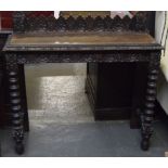 A victorian extensively carved hall table.