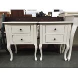 A pair of Laura Ashley bedside cabinets with two drawers on cabriole legs