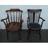 A smokers bow chair with spindle back and swept arms on turned supports,