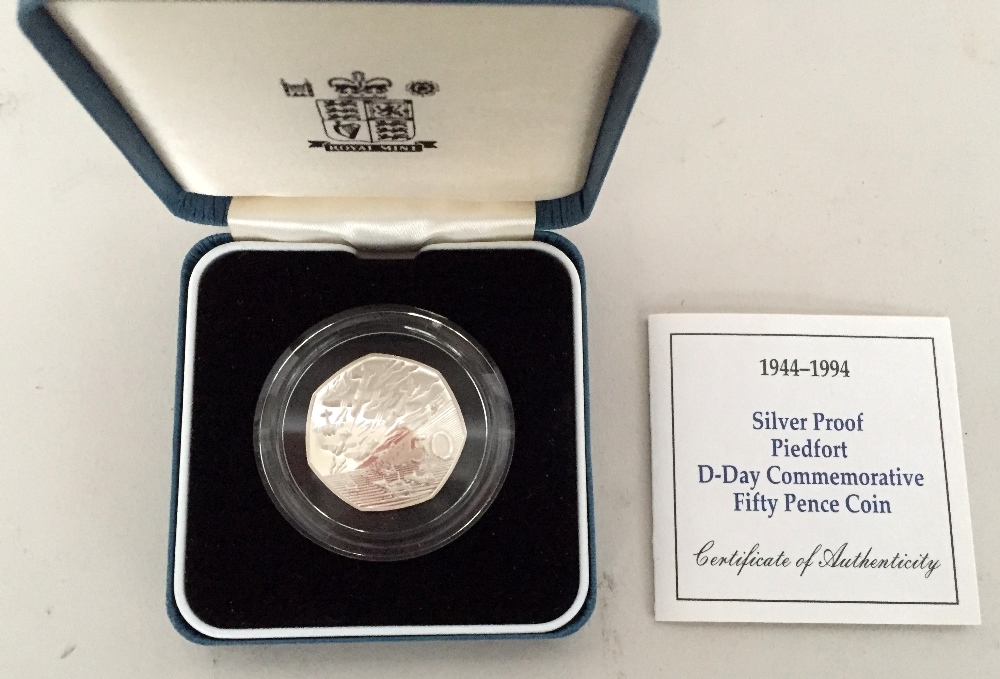 A 1994 silver proof piedfort D-Day commemorative fifty pence coin in case with certificate together