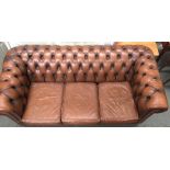 A three seater brown leather button back Chesterfield sofa made by Moran of Melbourne187cmW