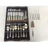 A canteen of mixed flatware with one other