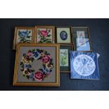 A quantity of framed embroideries and cross stitch patterns mainly of flowers and butterflies