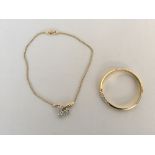 A small set of jewellery by Ciro to include a yellow metal necklace with three flowers made of