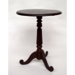 A teak side table with round top on pedastel base 70 x 54cm
