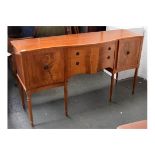 A McIntosh sideboard with two short drawers flanked by cupboards on tapering legs 90 x 162 x 52cm