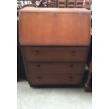 A 20th century bureau with three drawers on bracket feet 41x76x101cm