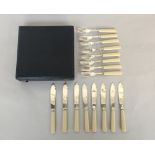 A boxed EPNS set of fish knives and forks with ivorine handles (16)