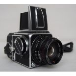 A Hasselblad 500C Camera, chrome, with Carl Zeiss Planar 1:2,8 f=80mm lens, black, serial no.