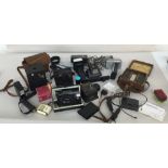 A box of cameras and other items such as flash units including a boxed Olympus XA2 35mm camera with