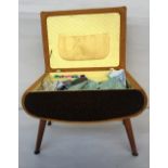 A 1960s Sherborne "Pandora" vintage sewing box with dansette legs and various sewing accessories