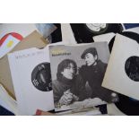 A quantity of 7" vinyl singles and EPs all related to The Beatles, including The Beatles, Yoko Ono,