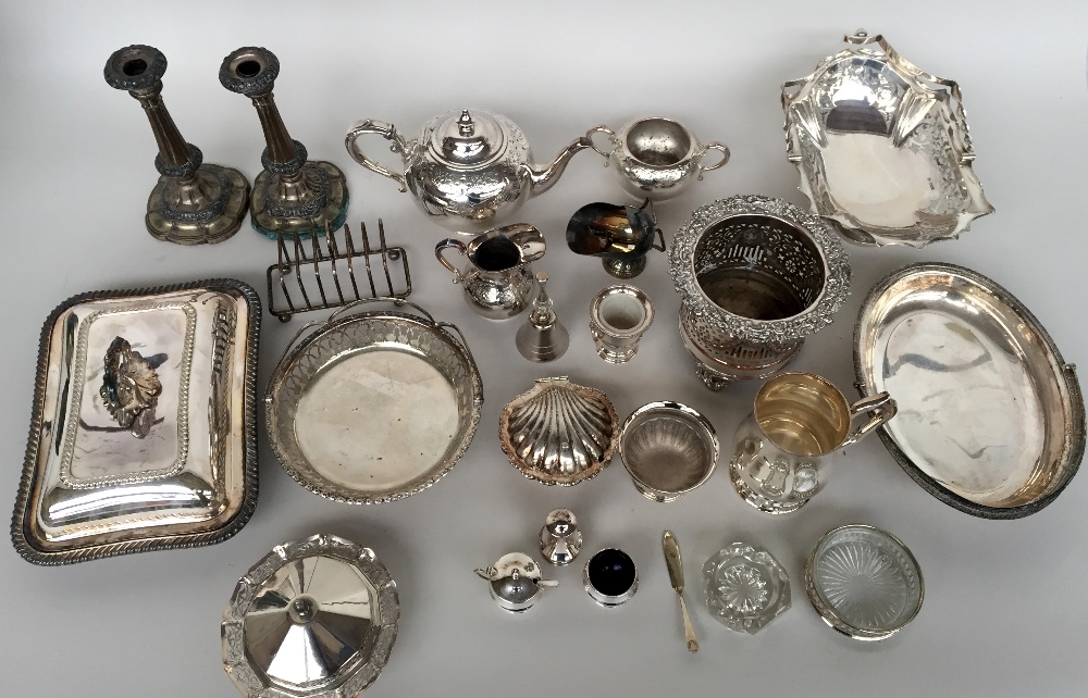 A large quantity of silver plate and white metal items including a teapot, serving trays, jugs,