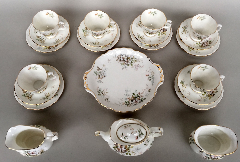 A Royal Albert 'Harwoth' bone china tea set including a tea pot and lid, one milk jug,