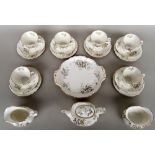 A Royal Albert 'Harwoth' bone china tea set including a tea pot and lid, one milk jug,