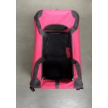 A black and red DuneIm pet carrier,