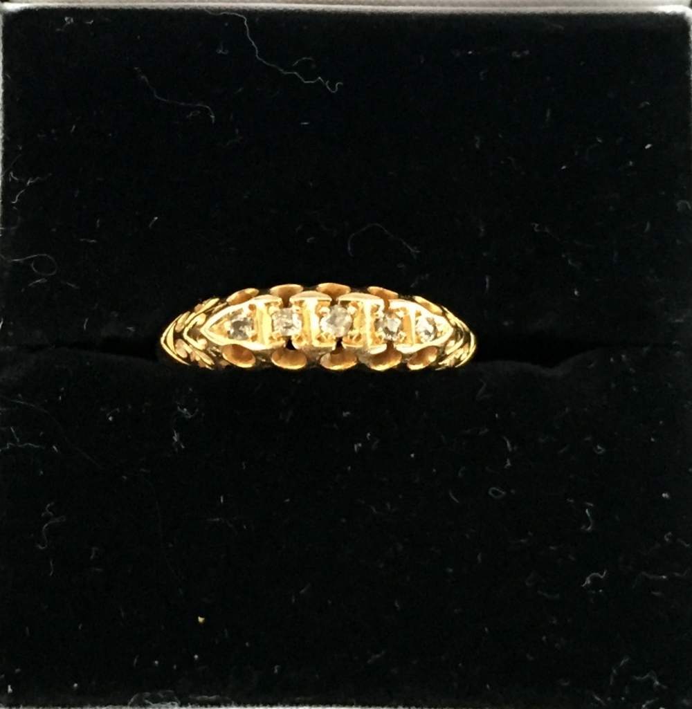 An 18ct gold ring with five diamond chips, hallmarked Viner's Ltd (Emile Viner) Birmingham,