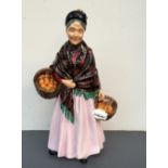 A Royal Doulton figure, The Orange Lady,