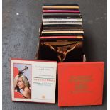 A box of vinyl LP box sets, mainly classical and opera,