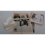 A number of Bob Dylan news clippings and sheet music
