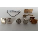 Four pairs of cufflinks and a tie bar