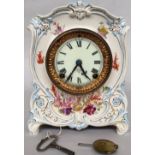 An early 20th century Ansonia La Tour porcelain china shelf clock by Royal Bonn,