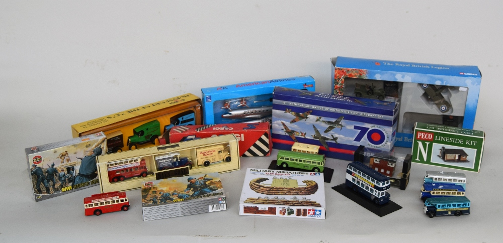A large collection of model cars and figures including both die cast and plastic and such names as