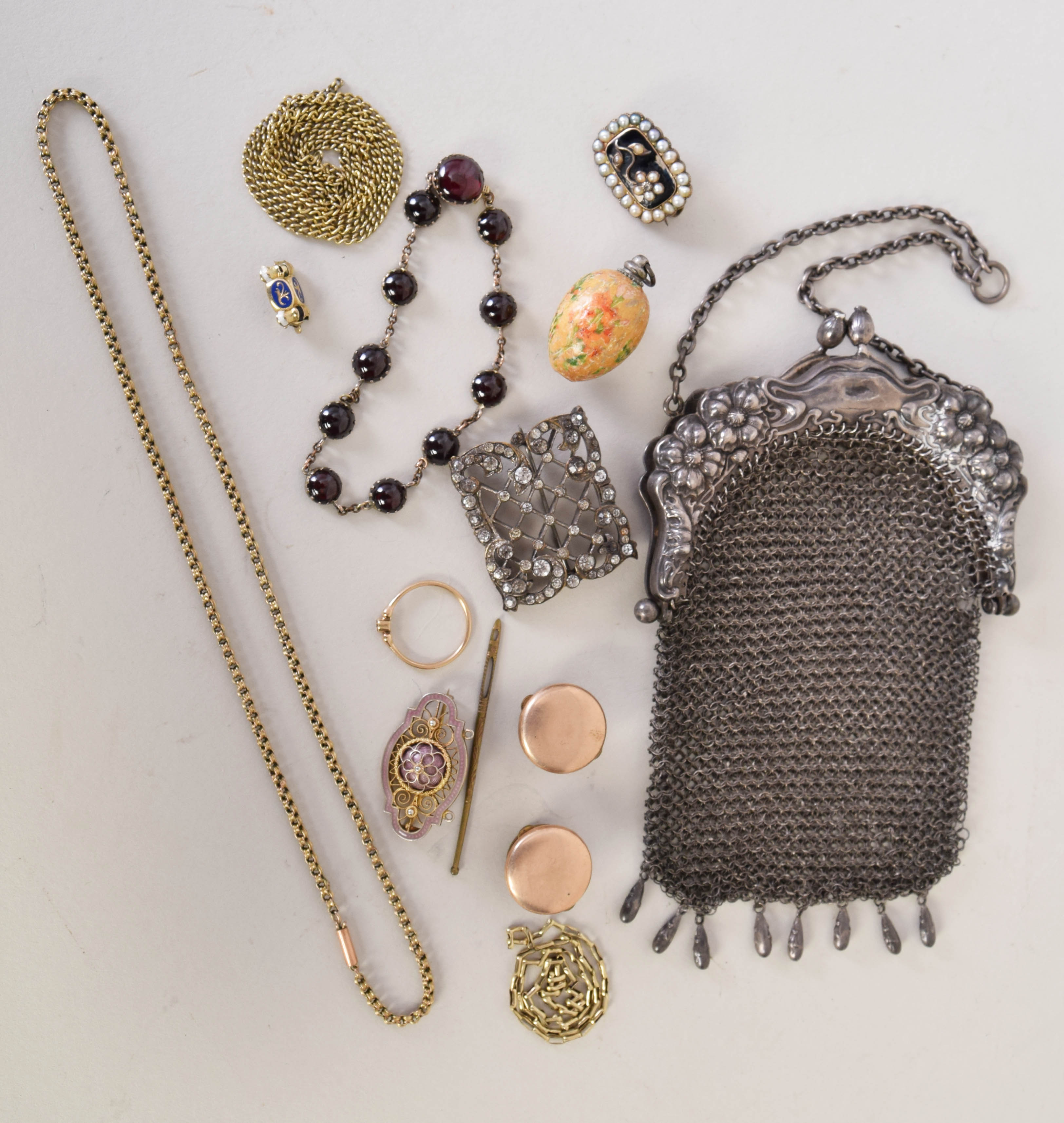 A mixed lot including a 19th century yellow metal and seed pearl mourning brooch,