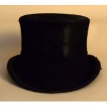 A small silk-lined mole skin top hat from Harman and Sons, 65 Jermyn Street, London,