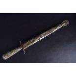 A late 20th century Argentinian ornamental dagger with scabbard stamped 'Industria Ju-CA Tandil