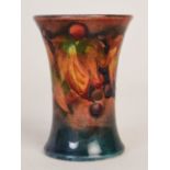 A small Moorcroft pottery vase in the 'Grapes' pattern,