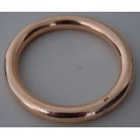 A gold plain circular bangle, late 19th/ early 20th century, marked 10ct, 6.5cmD, 0.