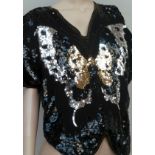 An L A Golo possibly 1980s sequinned fitted dress with very low back detail and slit to back seam -