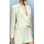 A cream 1980s/90s Emporio Armani fitted double breasted jacket with double back vent,